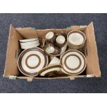 A box of Denby dinner ware