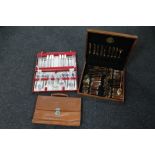 A leather satchel together with a cased set of Viners International stainless steel cutlery
