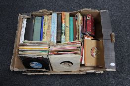 A box of small quantity of vinyl 7" singles, world music,