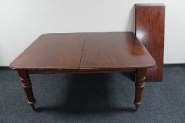 A Victorian mahogany wind out table with two leaves CONDITION REPORT: Unextended