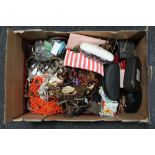 A box of costume jewellery and sunglasses