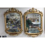 A pair of Victorian ornate gilt framed girandole mirrors CONDITION REPORT: Each