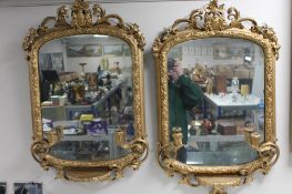 A pair of Victorian ornate gilt framed girandole mirrors CONDITION REPORT: Each