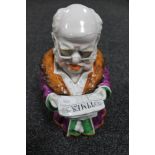 A Victorian ceramic lidded tobacco jar - man reading the Times