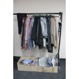 A rail of gent's suit trousers, jackets, two boxes of shirts, jumpers, some with tags,