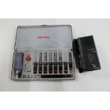 A cased Rotring Vario pen set including nibs and inks together with a Sanyo dictaphone