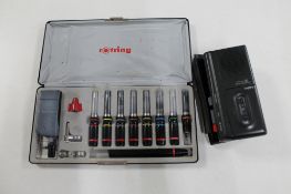 A cased Rotring Vario pen set including nibs and inks together with a Sanyo dictaphone