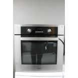 A Cata brushed steel electric integrated cooker