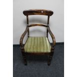 An antique mahogany armchair