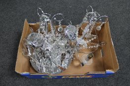 A box of two contemporary chrome five way light fittings with glass drops,