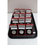 A tray of twelve cased Pobjoy mint Gibraltar commemorative coins