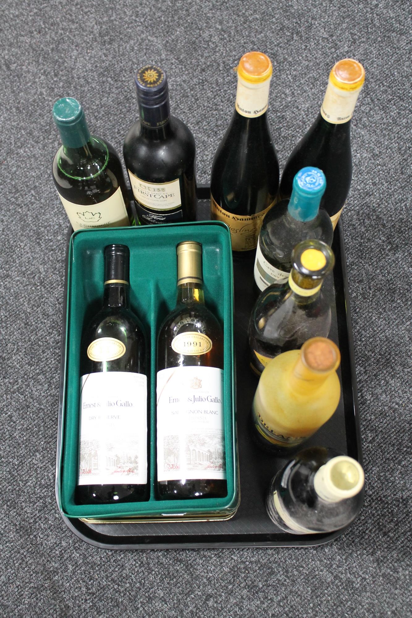 A tray of two bottles of Ernest & Julio Gallo Californian wine in presentation tin and eight