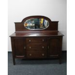 An Edwardian mahogany mirror backed sideboard