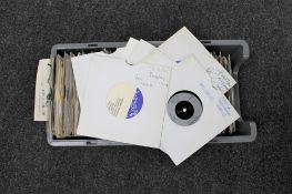 A crate of approximately 200 new old stock American import 7" singles including coloured vinyl