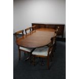 An eight piece Regency style inlaid mahogany dining room suite - sideboard,