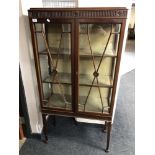 A late Victorian mahogany display cabinet