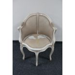 A contemporary French style painted framed elbow chair