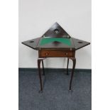 A Victorian mahogany envelope card table