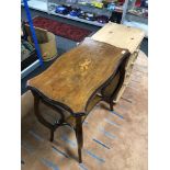 A Victorian inlaid mahogany occasional table