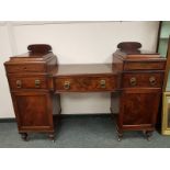 A Regency mahogany Scottish twin pedestal sideboard, 184 cm.