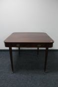 A Victorian inlaid mahogany turnover top tea table fitted with a drawer (a/f)