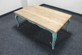 A French style pine topped coffee table on painted base