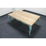 A French style pine topped coffee table on painted base