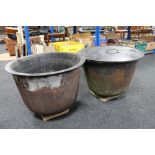 Two cast iron smelting pots, one with lid.