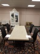 A contemporary high gloss granite dining room table, length 180 cm,