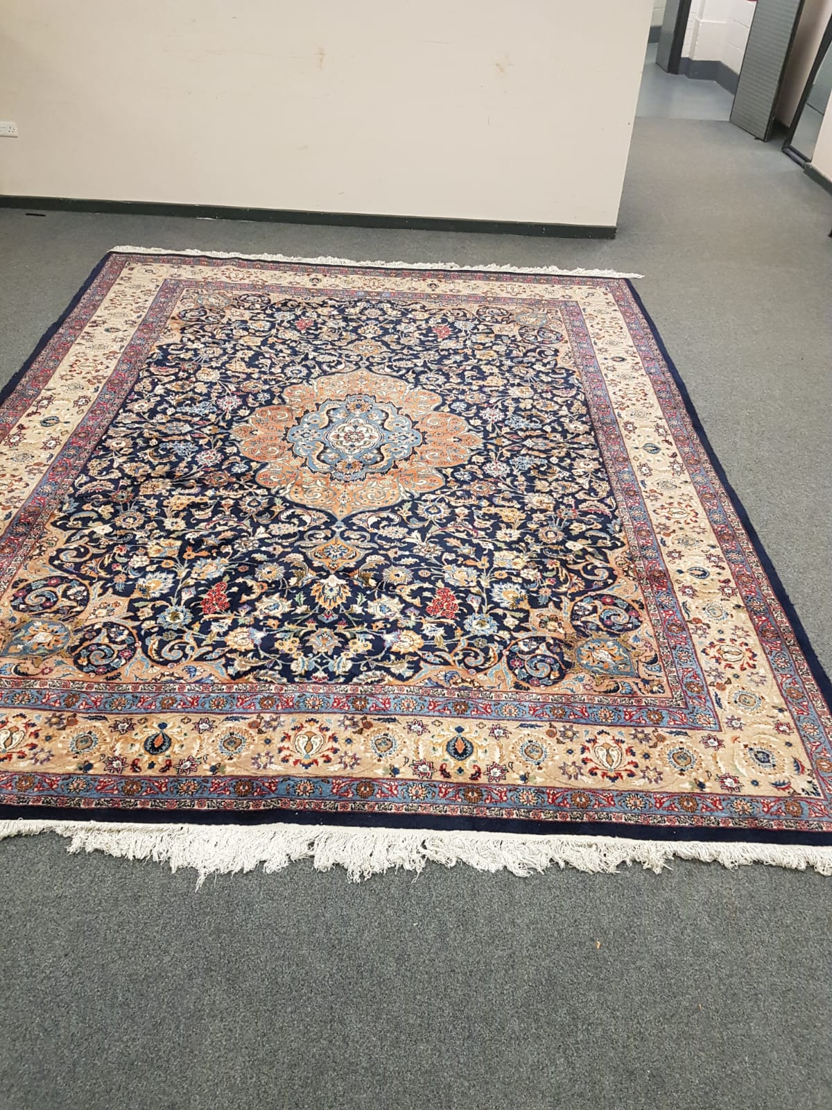 A Kachmar carpet, on blue ground,
