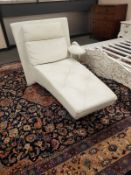 A contemporary cream leather chaise longue,