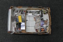 A box of Dr Who and wrestling trading cards