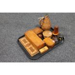 A tray of treen pieces, brass jug, trinket boxes, cribbage board,