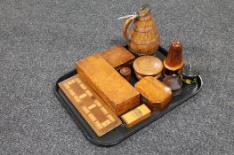 A tray of treen pieces, brass jug, trinket boxes, cribbage board,