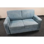 A two seater bed settee upholstered in a blue fabric