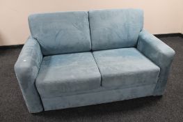 A two seater bed settee upholstered in a blue fabric