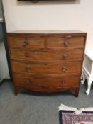 A George III mahogany bowfront chest,