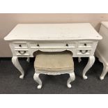 A contemporary white dressing table on cabriole legs with matching stool, width 110 cm.