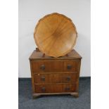 A 1930's walnut three drawer chest together with a walnut pie crust coffee table