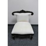 A contemporary low backed nursing chair
