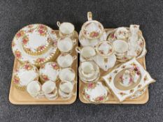 Two trays of fifty-three pieces of Royal Albert Old Country roses tea,