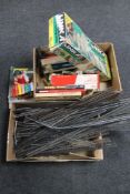 A large quantity of assorted train track, rolling stock, books on train, model building system,