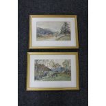 A pair of gilt framed early 20th century watercolours depicting figures in a rural landscape