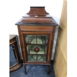 An Edwardian inlaid mahogany display cabinet