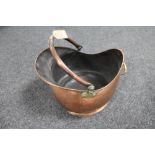 An antique copper and brass swing handled coal bucket