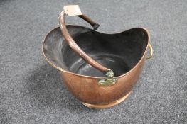 An antique copper and brass swing handled coal bucket