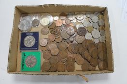 A box of two £5 coins, two further Crowns, silver and copper coins,