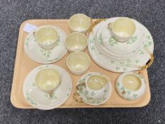 A twenty-four piece Belleek tea service CONDITION REPORT: Milk jug with crack