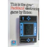 A boxed Entex PacMan 2 electronic hand held game