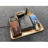 A tray of vintage Kodak camera in case, leather cased field glasses, gent's travel set,